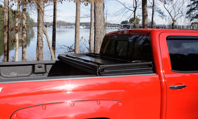 Lund 15-17 Chevy Colorado Fleetside (5ft. Bed) Hard Fold Tonneau Cover - Black
