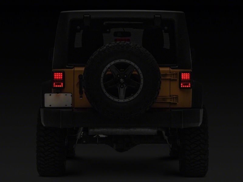 Raxiom 07-18 Jeep Wrangler JK Axial Series Lux LED Tail Lights- Black Housing (Clear Lens)