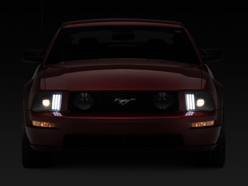 Raxiom 05-09 Ford Mustang w/ Halogen Projector Headlights- Black Housing (Clear Lens) (No GT500 )