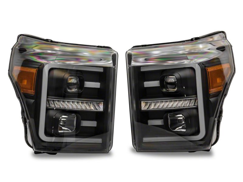 Raxiom 11-16 Ford F-250 Super Duty LED Projector Headlights - Black Housing (Clear Lens)