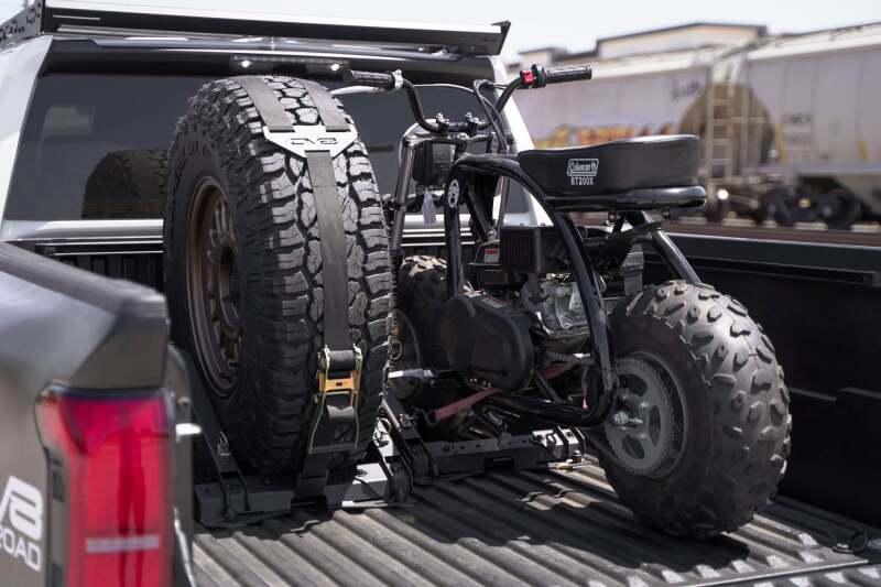 DV8 Offroad Truck Bed Universal Tire Carrier & Accessory Mount