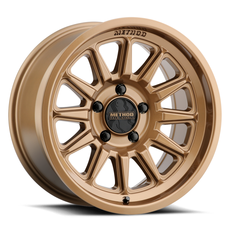 Method Wheels Method MR323 18x9 / 8x170 BP / 12ET / 5.44in BS / 130.81mm CB - Gloss Bronze Wheel