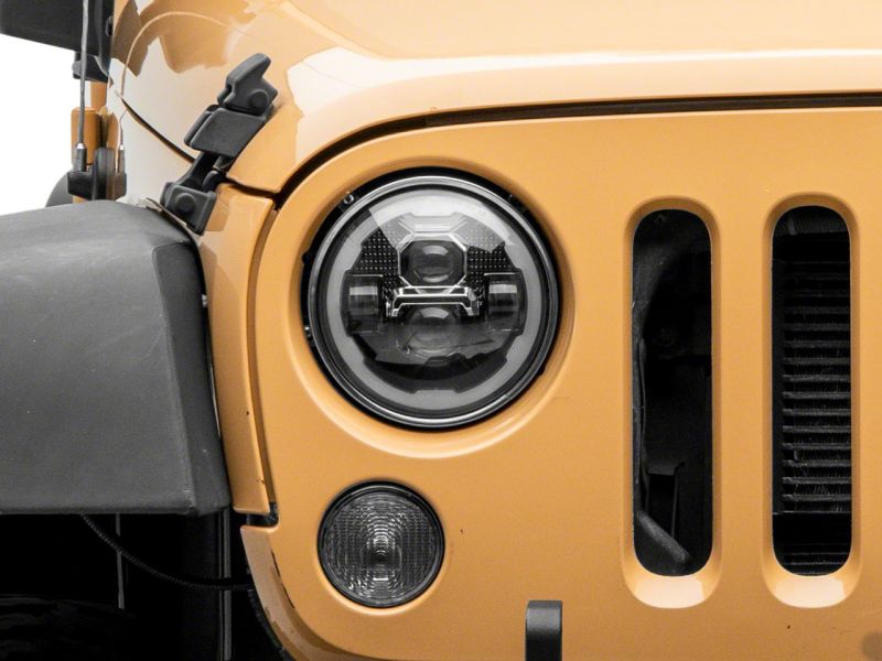 Raxiom 07-18 Jeep Wrangler JK Axial 7-In LED Headlights w/ DRL Turn Signals- Black Housing (Clear)