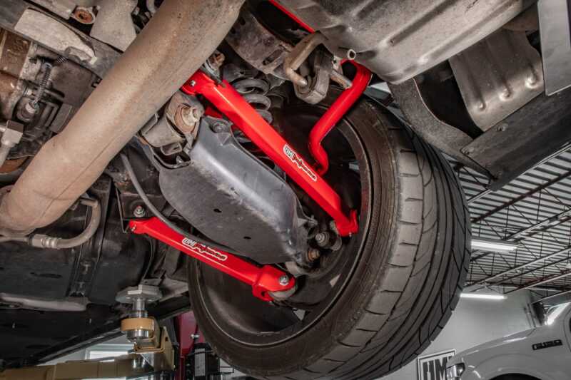 UMI Performance 16-24 Chevrolet Camaro Suspension Trailing Arm - Red