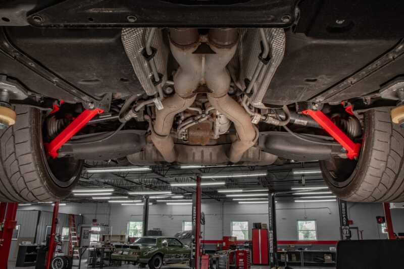 UMI Performance 16-24 Chevrolet Camaro Suspension Trailing Arm - Red