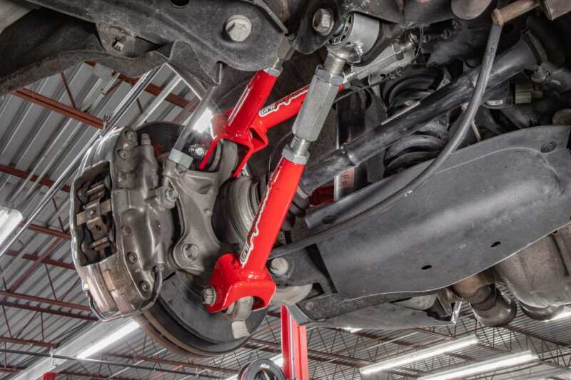 UMI Performance 16-24 Chevrolet Camaro Suspension Control Arm - Red