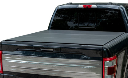 Access LOMAX 2022+ Rivian R1T 4ft 6in Bed (w/ OEM Tonneau Track) Folding Hard Cover - Carbon Fiber