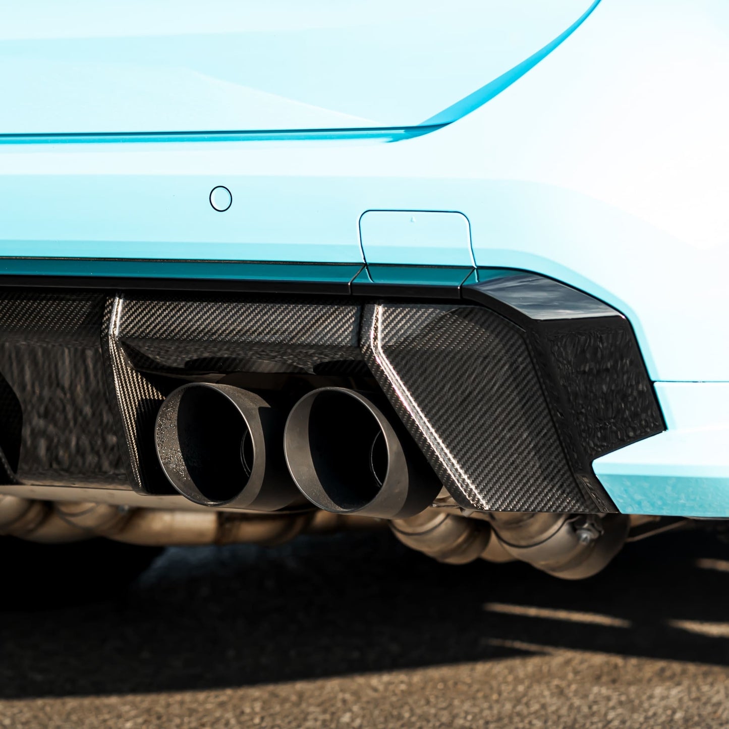 MANHART MH5G8011200-7 SLIP-ON SPORT EXHAUST FOR BMW G8X M3 / M4 (COMPETITION / CSL) WITH VALVE CONTROL BY REMUS